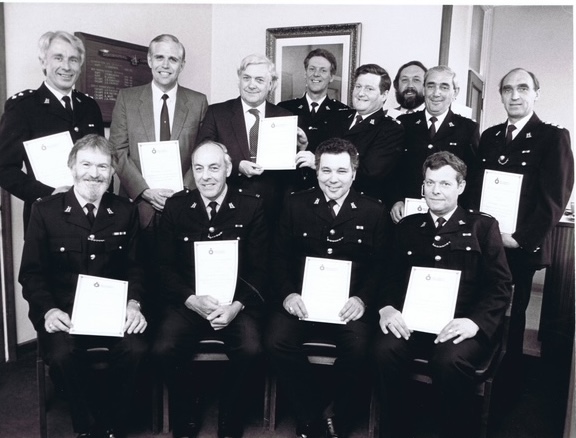 Warwickshire Police officers posing for a formal station photograph